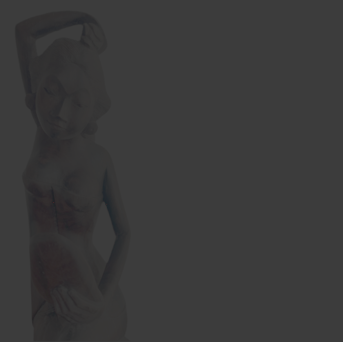 Scultura Balinese  in legno di palissandro intagliata a mano.